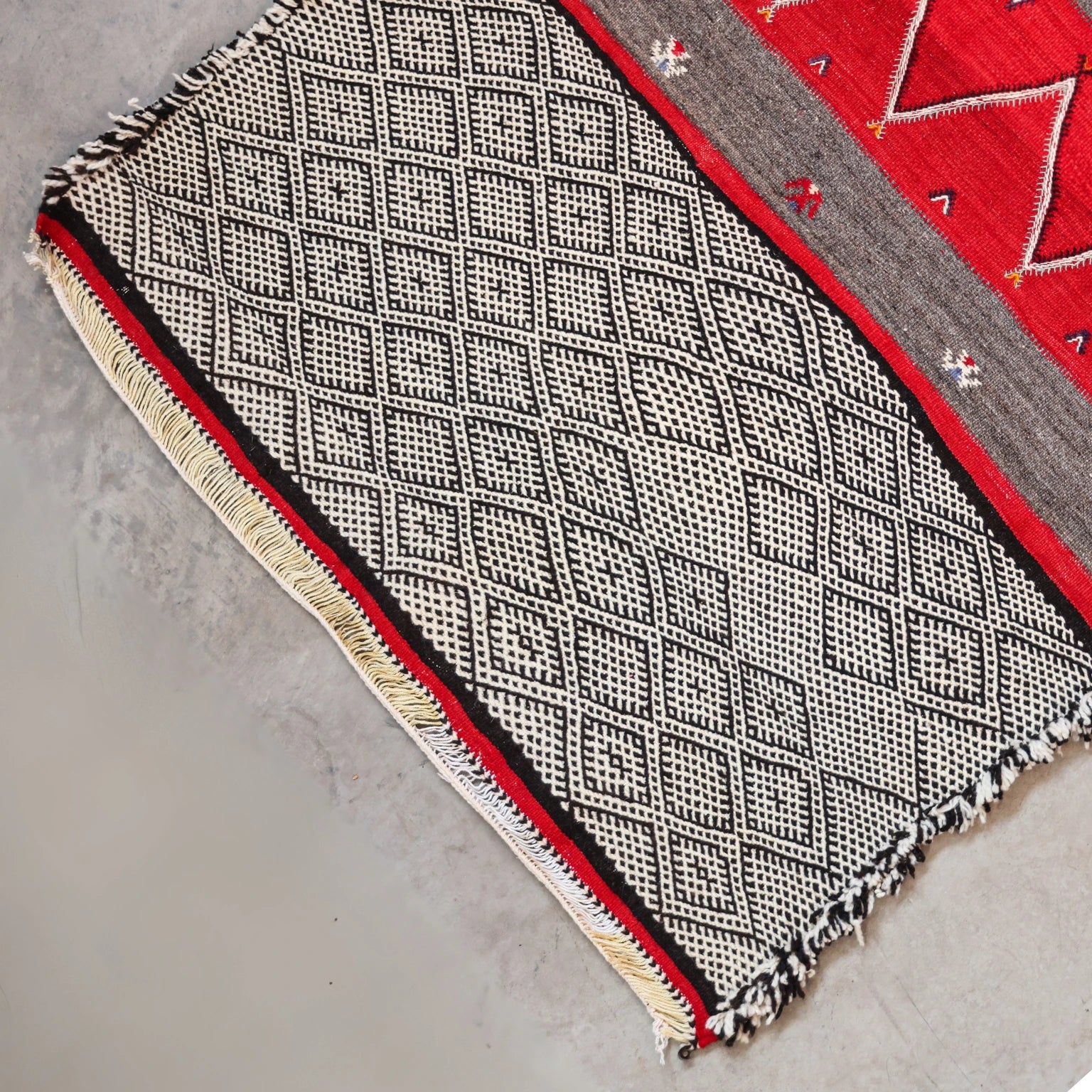 Textile with geometric pattern on a plain background